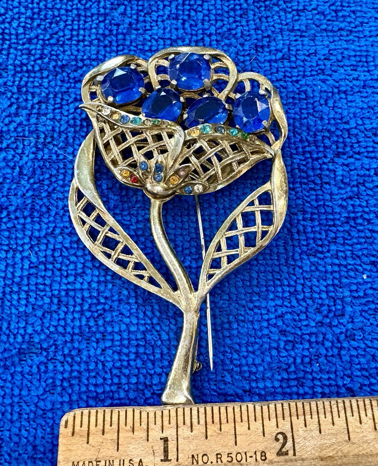 vintage “Little Nemo” rhinestone flower basket brooch