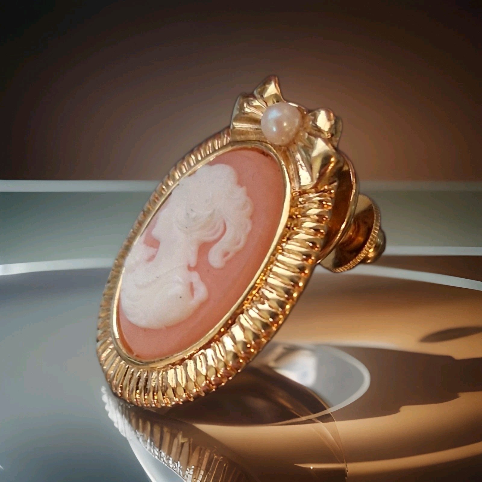 Vintage Cameo Brooch Gold Tone Oval Portrait Pin with Faux Pearl Bow Accent