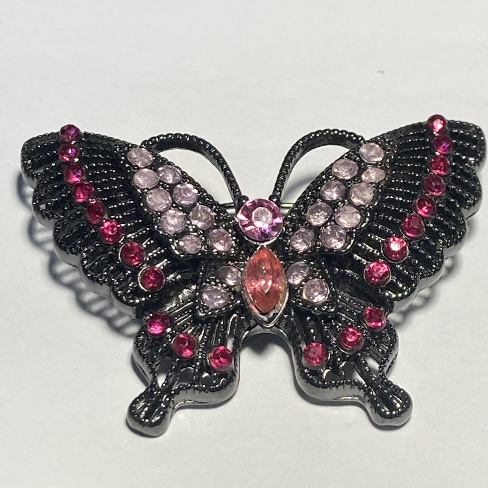 butterfly brooch filagree antique black colored metal tone pink red peach stones