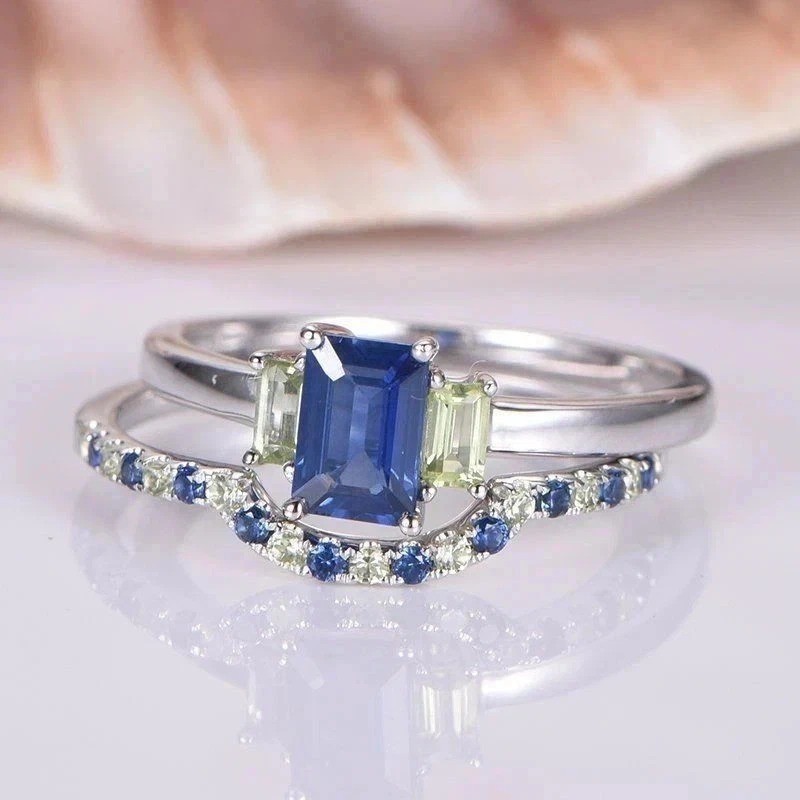 2.2Ct Emerald Cut Lab Created Sapphire & Diamond Engagement 14K Gold FN Ring Set
