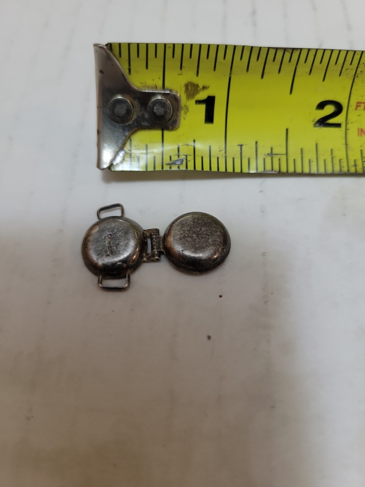 Vintage movable waffle iron sterling charm.