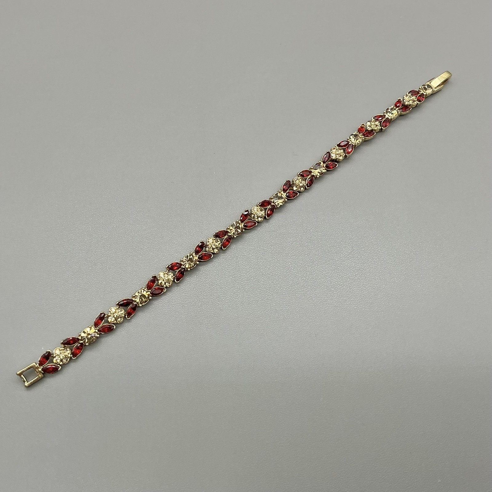 Vintage Monet Bracelet Red Clear Rhinestone Tennis Gold Tone Womens Jewelry