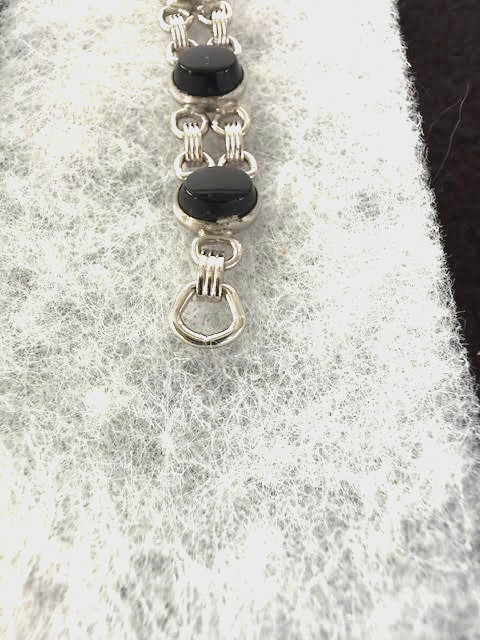 ADMARK, NEW OLD STOCK, SIX ONYX BRACELET WITH SAFETY CHAIN 12K GOLD FILLED ADM60