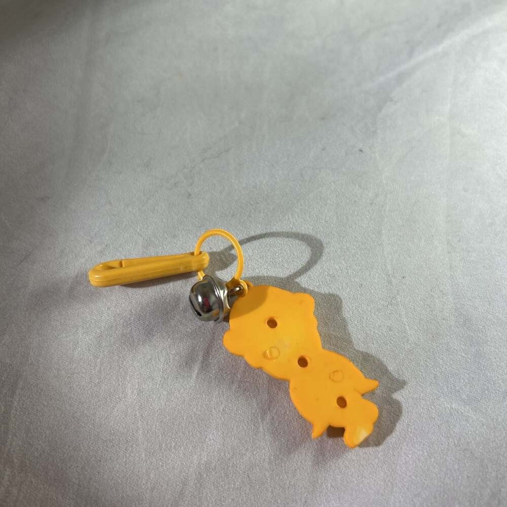 Vtg 80’s Plastic orange boy Clip On Charm with Bell For Charms Necklace