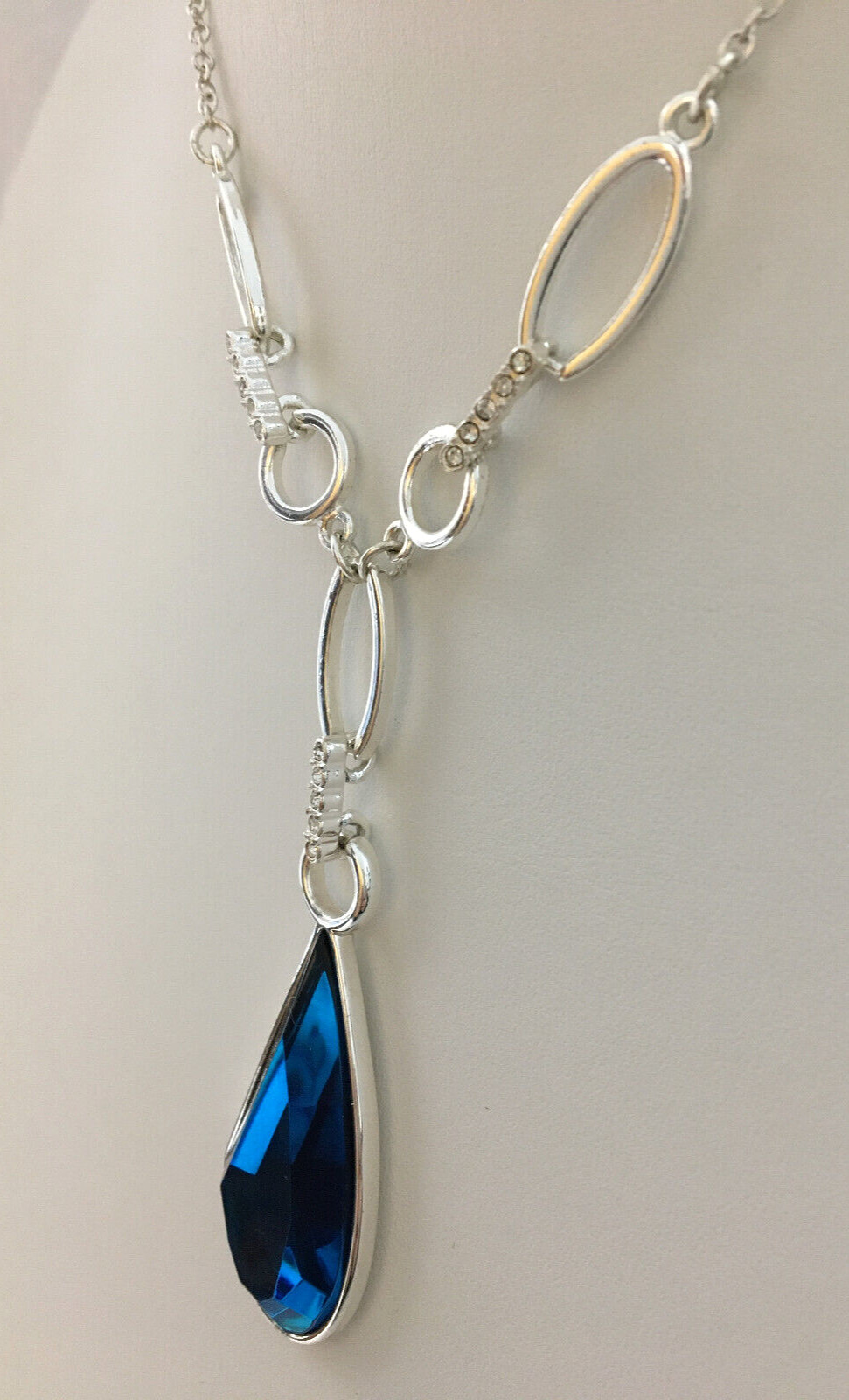 Silver Tone Necklace Blue Faceted Teardrop Pendant And Clear Rhinetone Accents