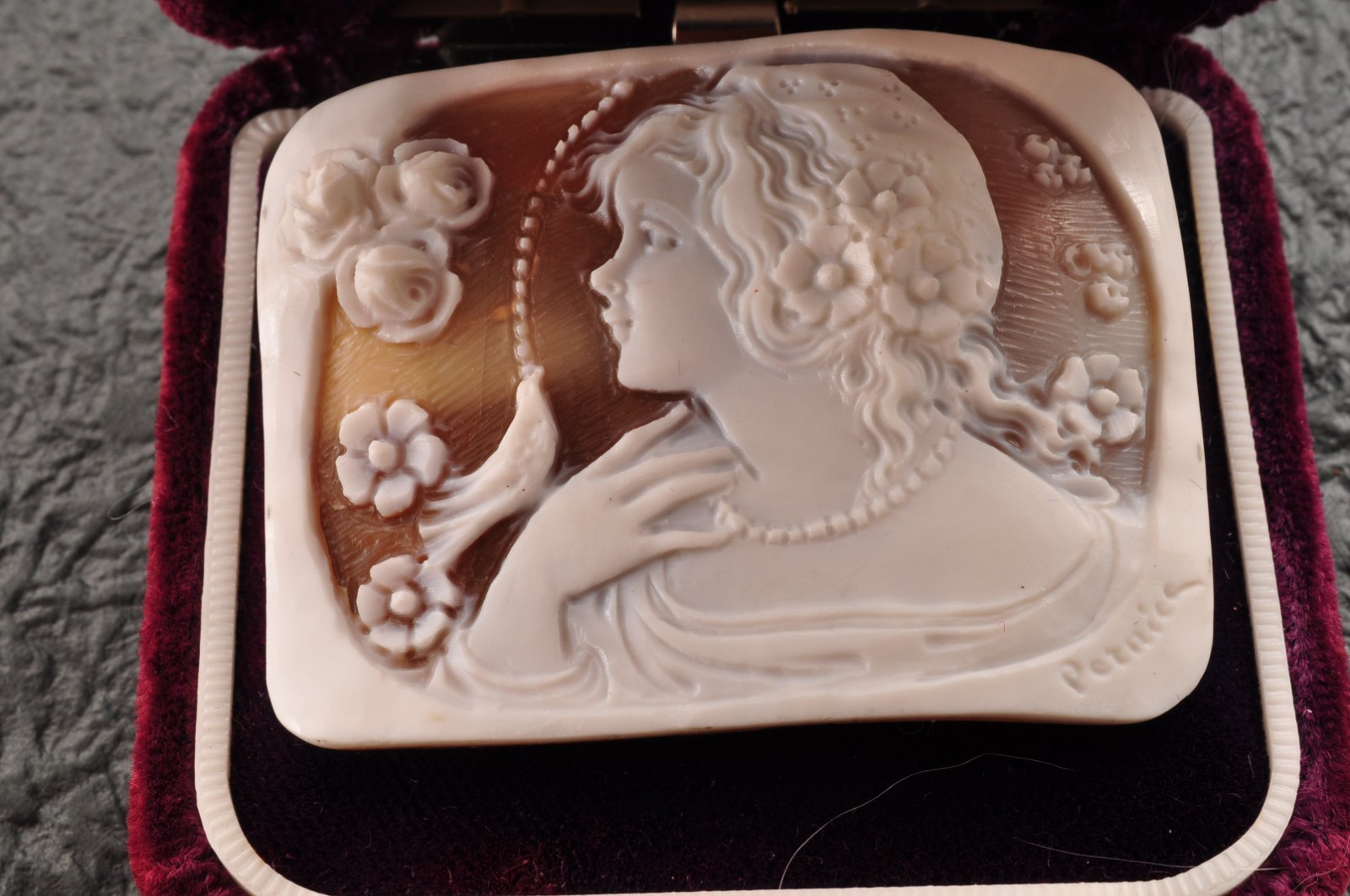 Vintage square shell cameo “Girl and little bird” (57.5ct) sign by artist, case.