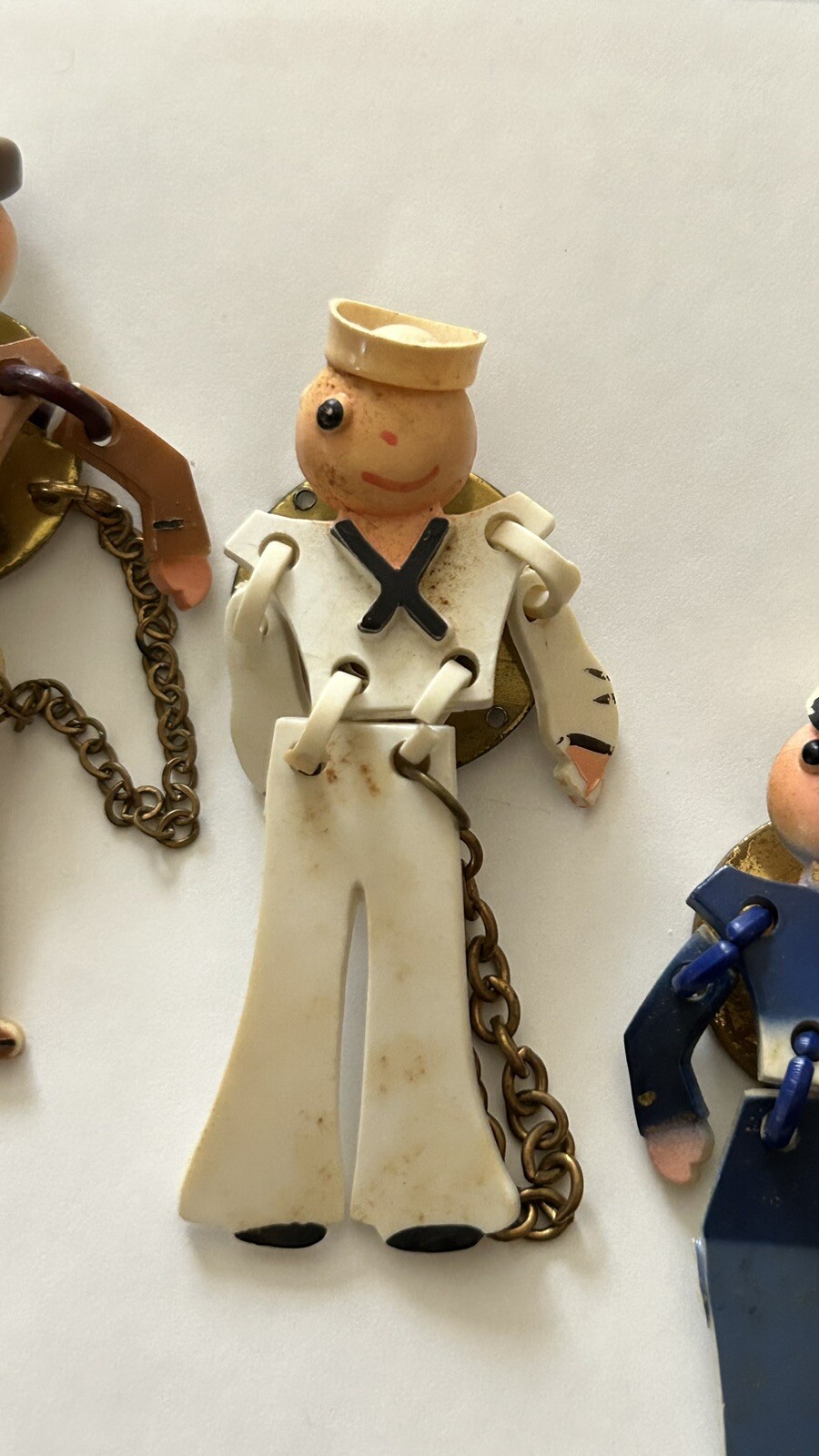 3 Vntg painted celluloid JOINTED SOLDIER ARMY PIN WWII era articulated men 2.5″