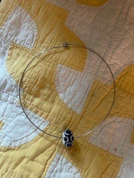 SS NECK WIRE WITH BLACK & WHITE GLASS BEAD, FROM PARIS – NEW, NEVER WORN