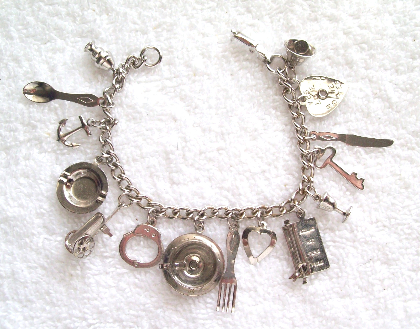 Vintage Coro Bright Silver-Tone Charm Bracelet with 15 Charms