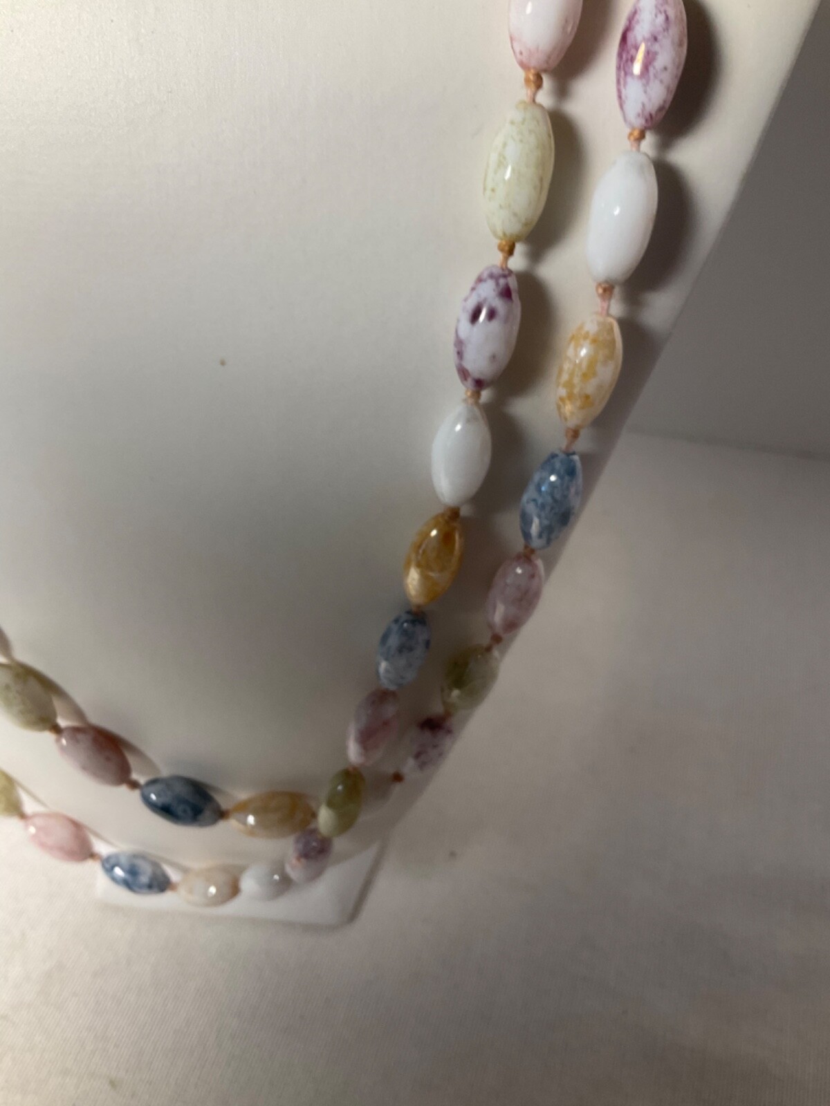 Necklace glass oval shaped beads approximately 50”