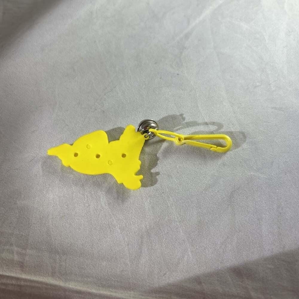 Vintage 1980s Plastic Bell Charm Yellow clown Googly Eyes Clip-on Toy