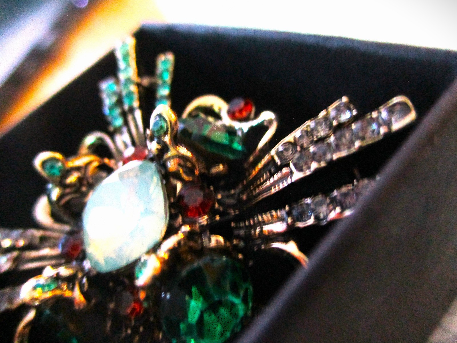 large brooch gold tone with faux opal + red, green &clear zircons