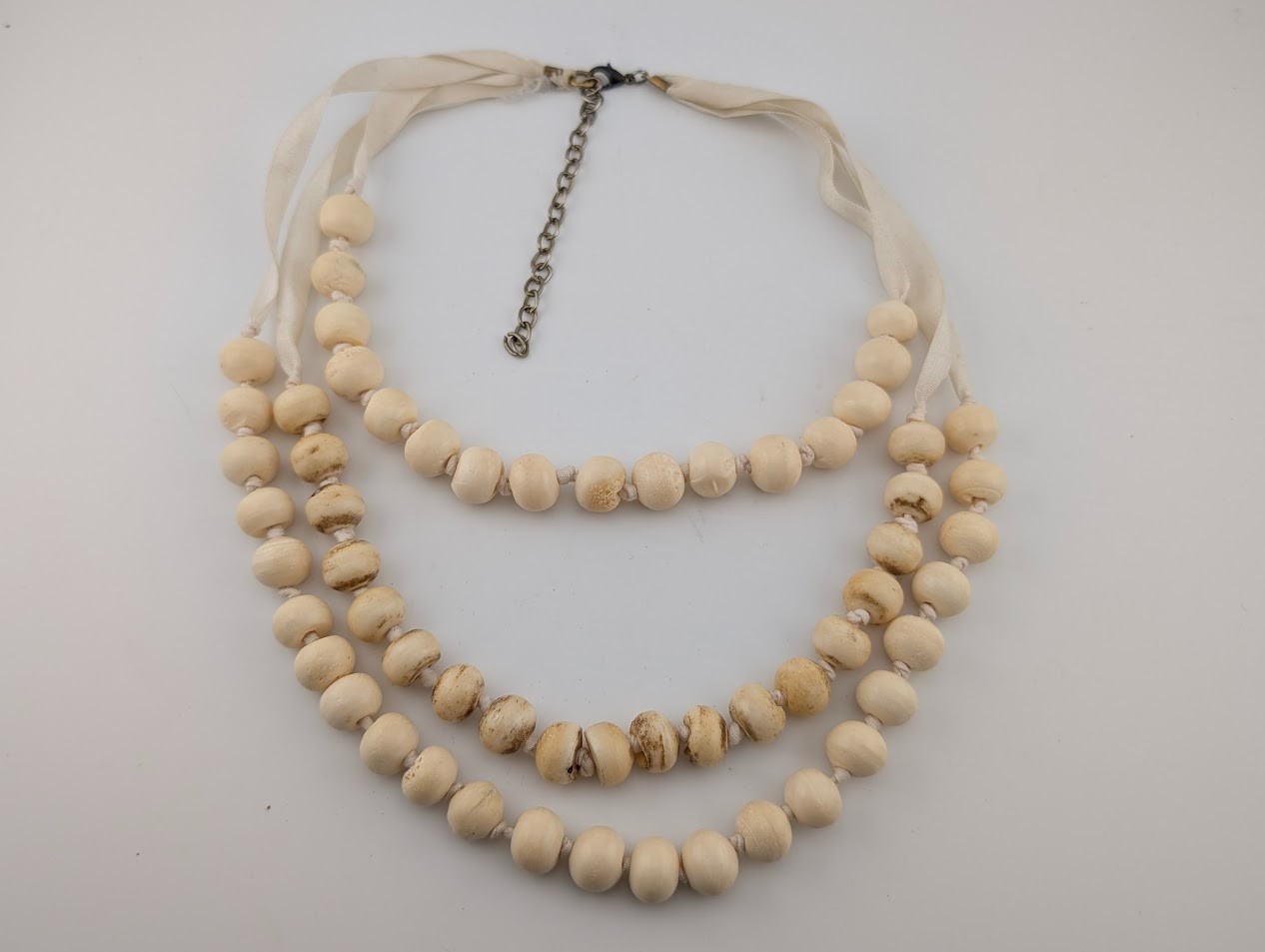 3-TIER COW BONE NECKLACE hand carved old beads on cream colored ribbon boho B5