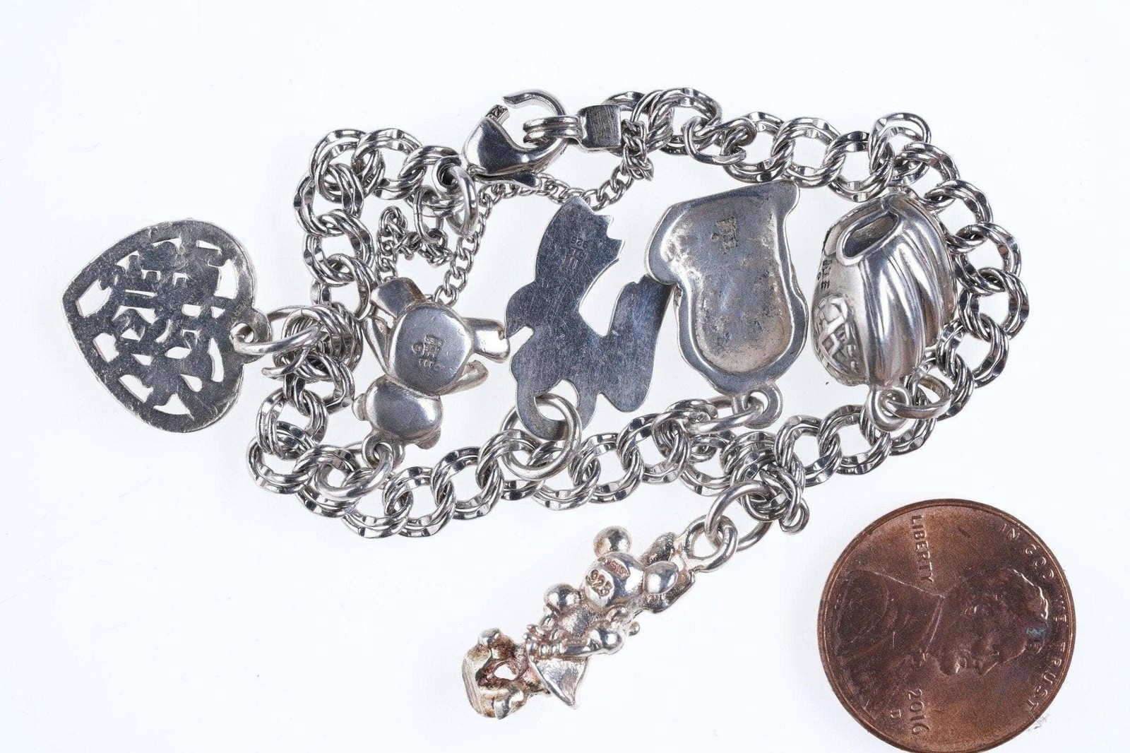 6.75″ James Avery Sterling silver Charm bracelet with lots of charms