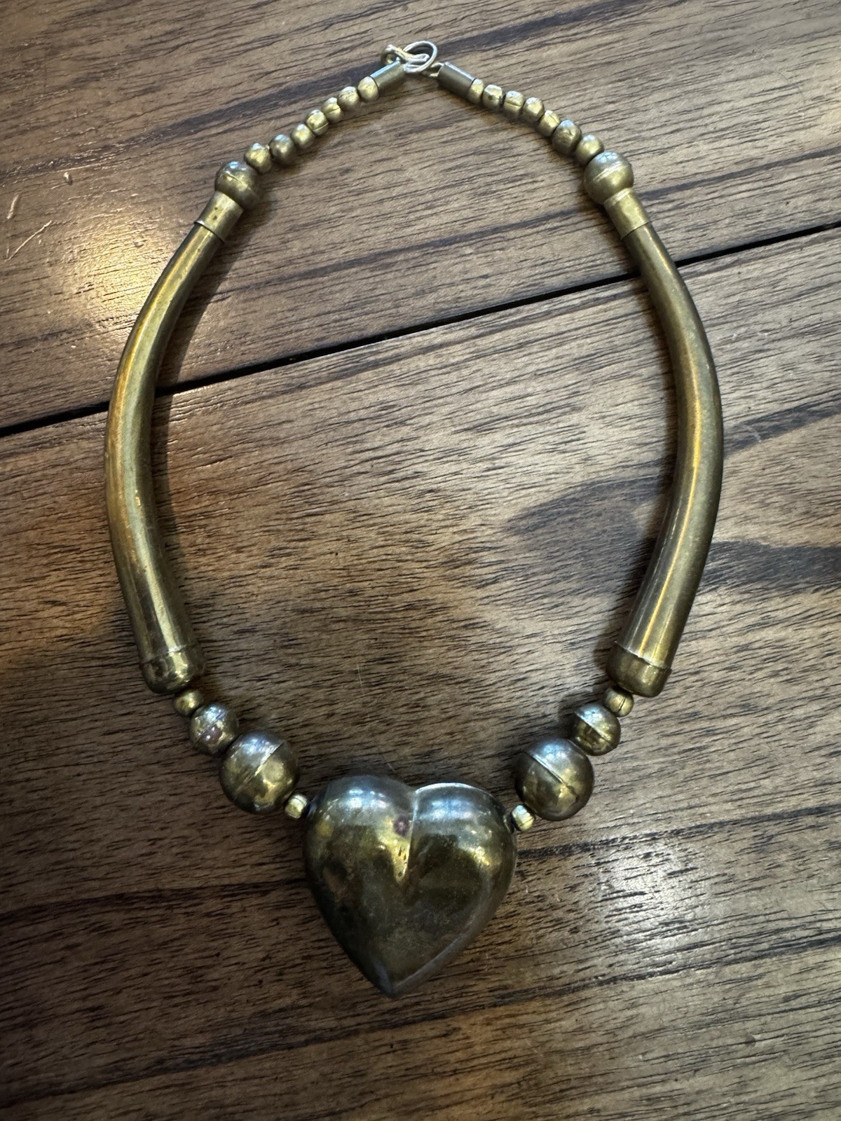 Vintage brass plated segmented heart statement necklace