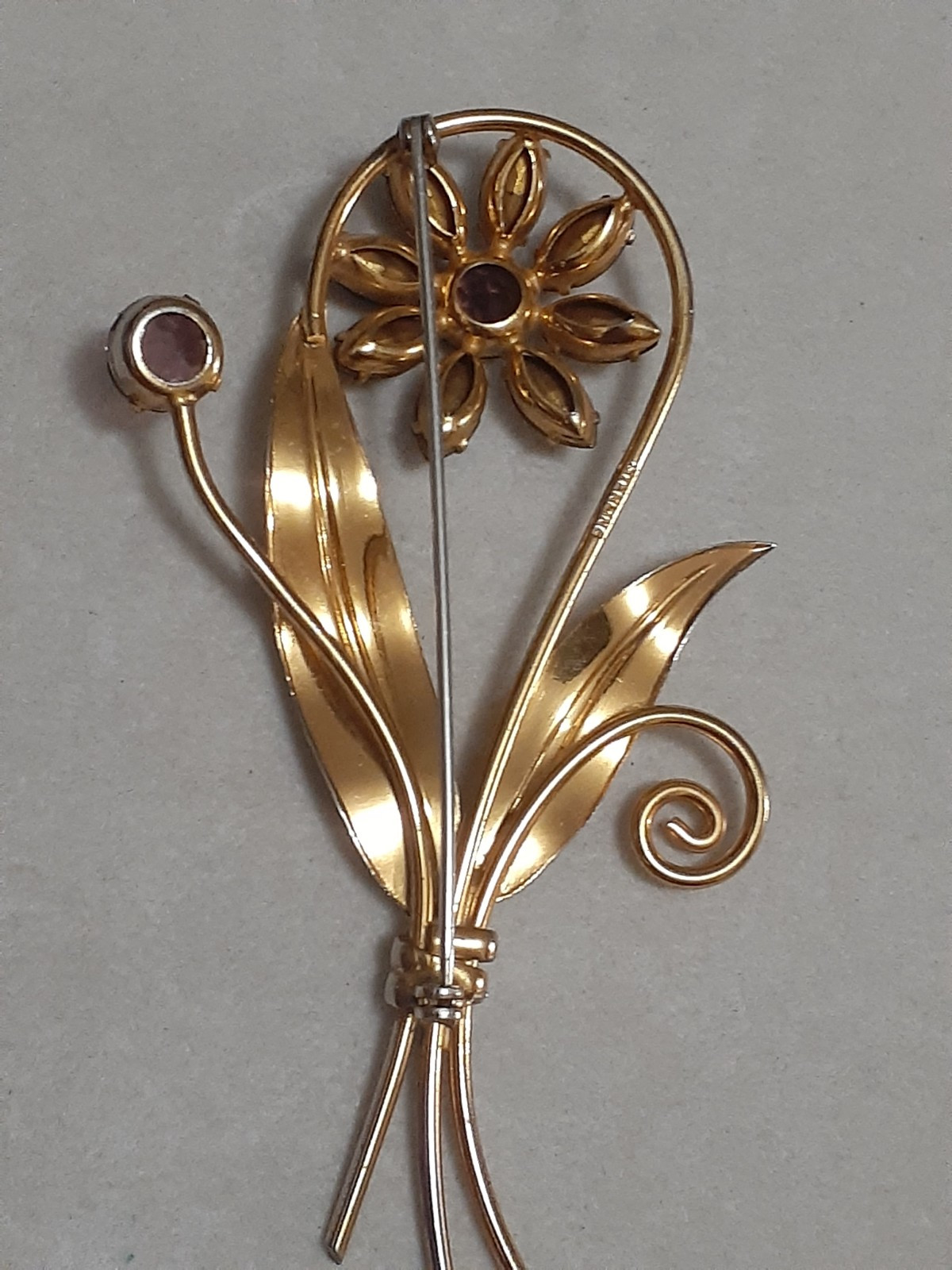 Sterling silver gold plated prong set purple glass flower & stem leaf brooch