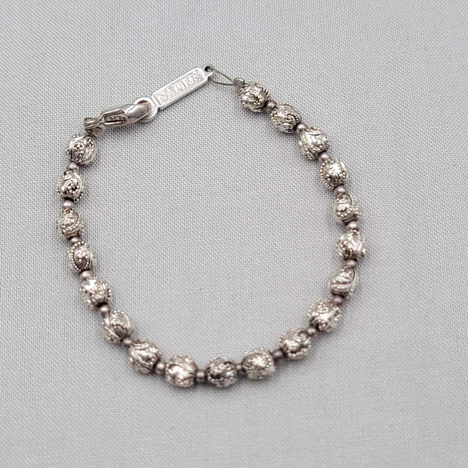 Vintage Napier Embossed Silver tone Bead Bracelet 6.75″