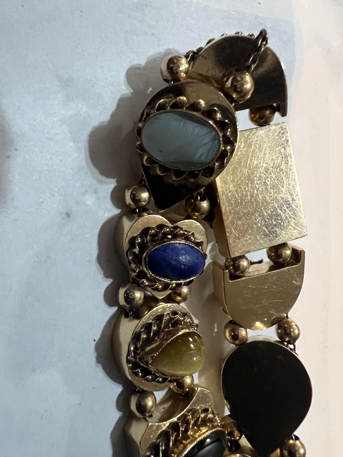 14k Gold ANTIQUE VICTORIAN GOLD CHARMS SLIDE BRACELET. CIRCA (1837-1901)