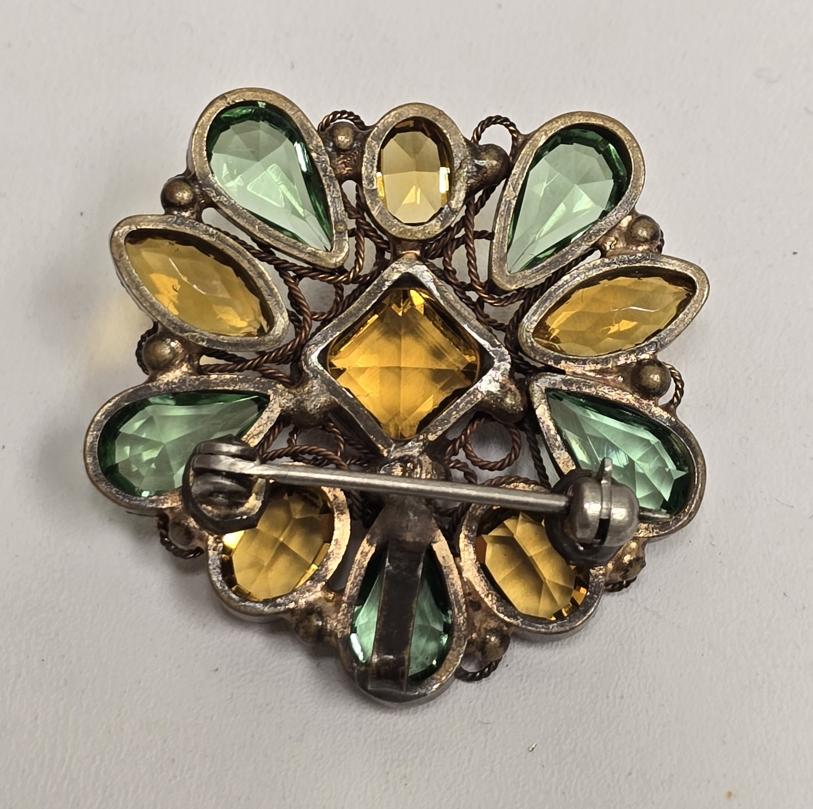 Vintage Fashioncraft Robert Brass Filigree Bezel Green Yellow Rhinestone Brooch