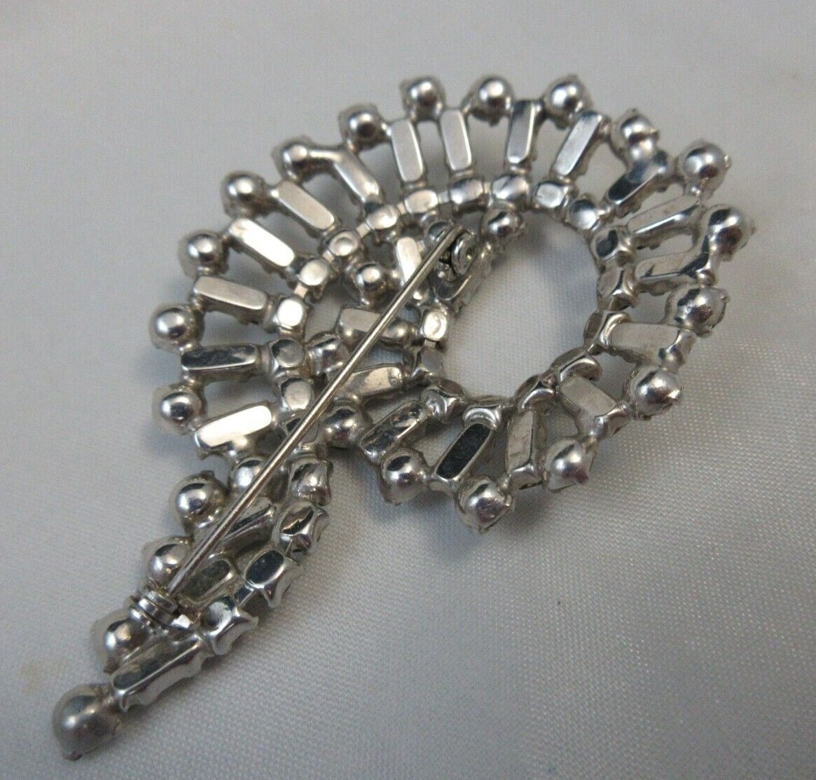 High End Prong Set Clear Rhinestone Brooch w/Baguette Stones Silver Tone Swirly