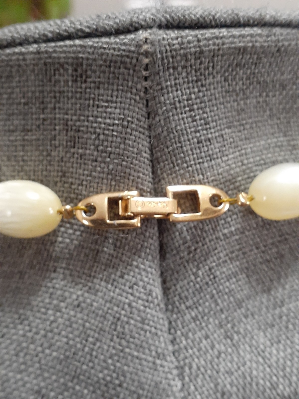 Napier champagne moonglow lucite bead necklace w/Chevron enamel pendant 24″