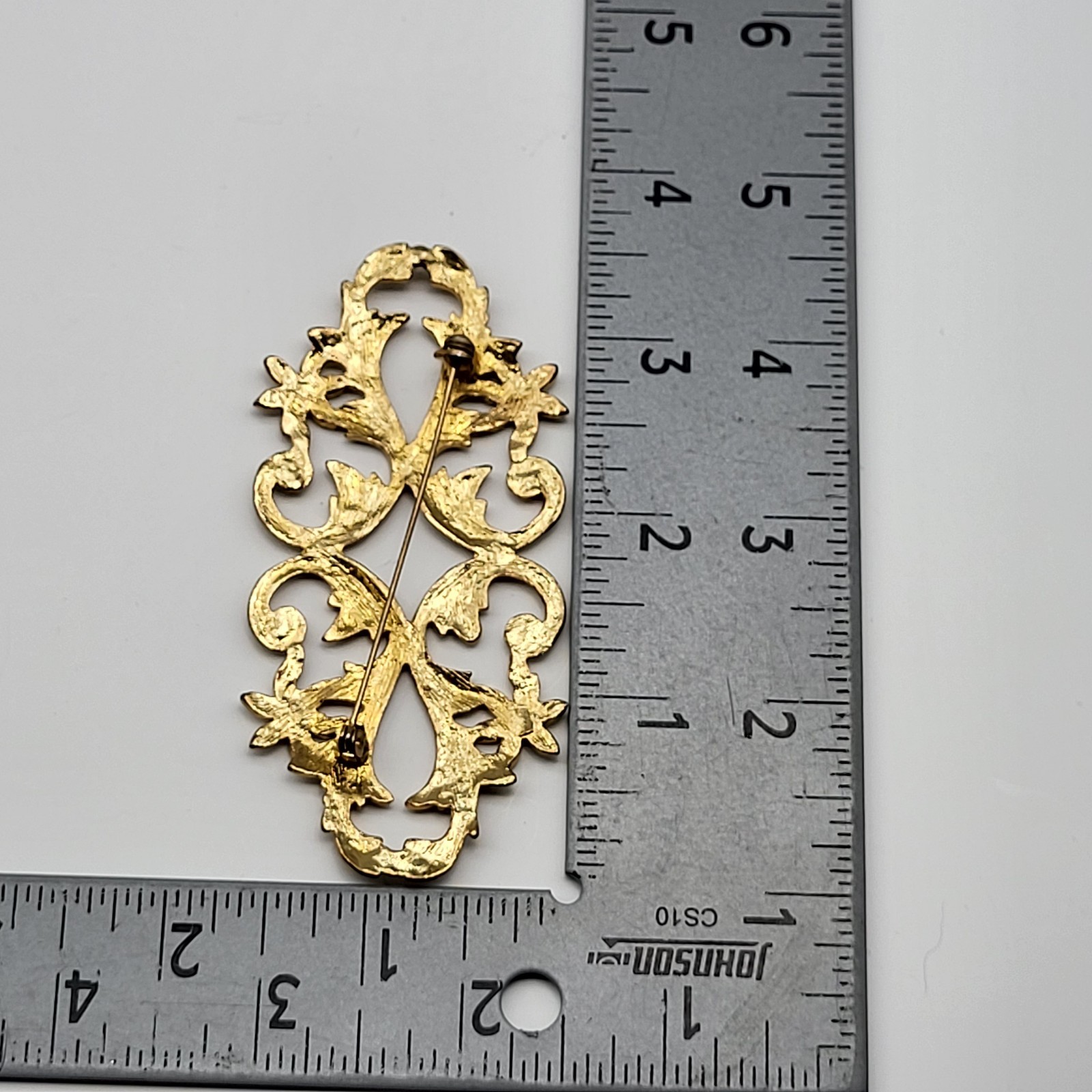 lovely vintage brooch pin elegant scrollwork rhinestone flower unsigned