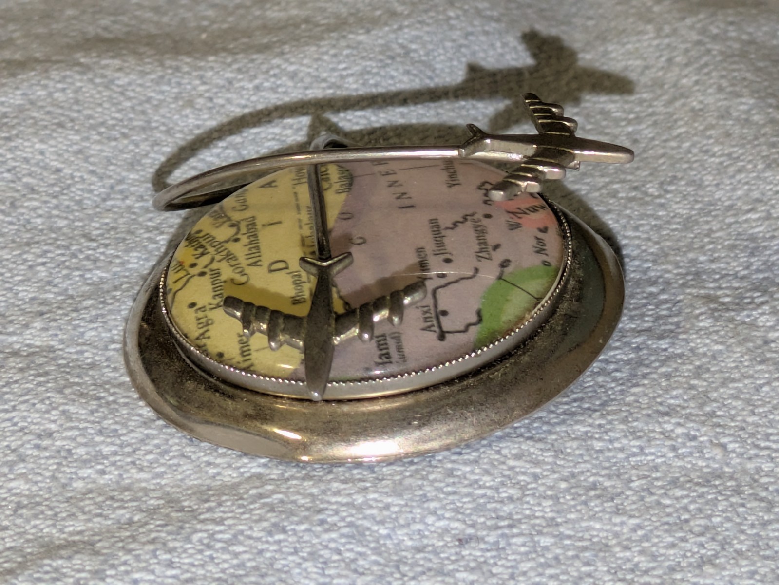 VINTAGE METAL TRAVEL BROOCH PIN JET PLANE AIRPLANES FLYING MAP ASIA INDIA CHINA