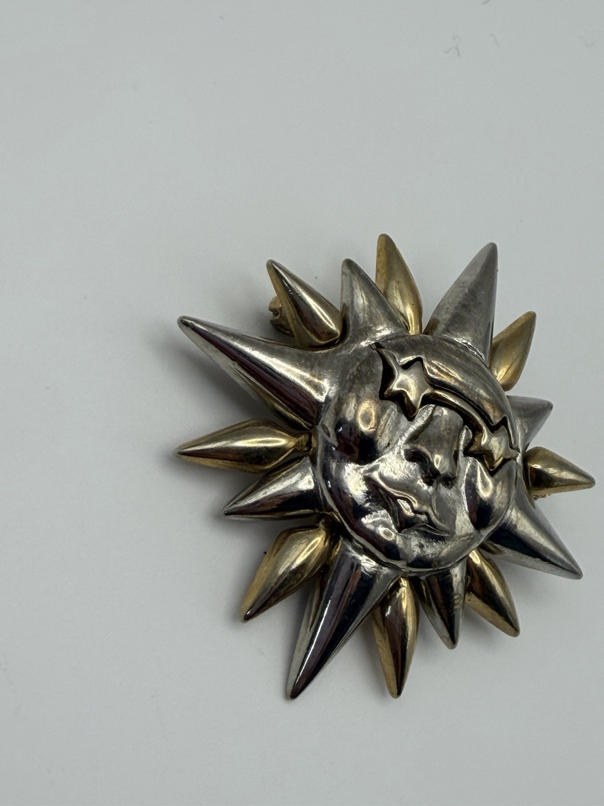 Star Sunburst Metal Brooch