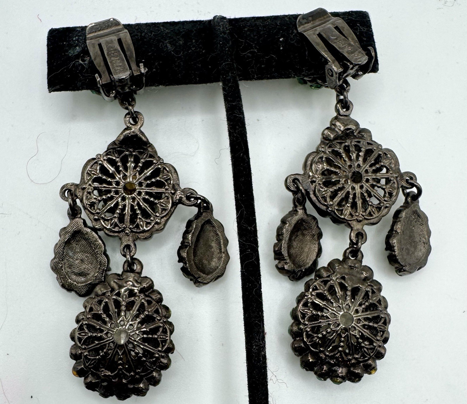 Barrera Crystal Clip-On Drop Earrings Of vibrant green crystals set in Gunmetal
