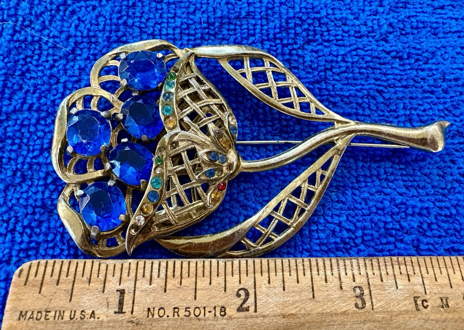 vintage “Little Nemo” rhinestone flower basket brooch