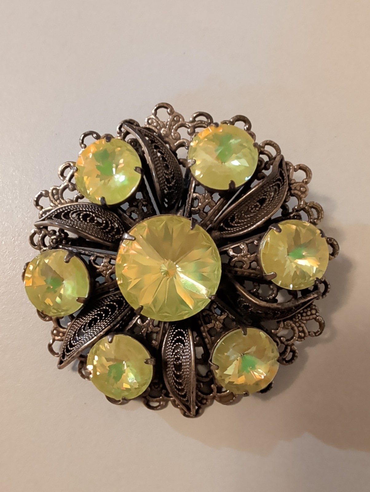 Vintage filigree Bronze Tone Brooch. UV Reactive. 2.5″