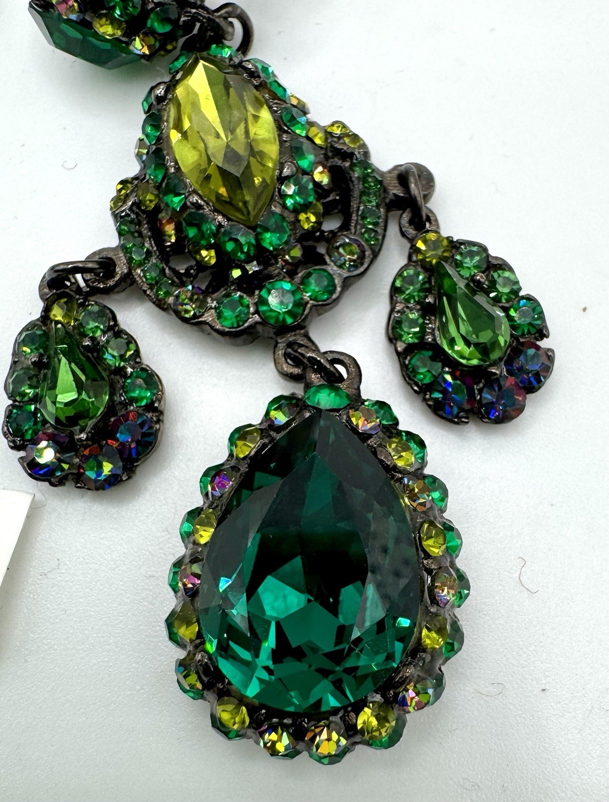 Barrera Crystal Clip-On Drop Earrings Of vibrant green crystals set in Gunmetal