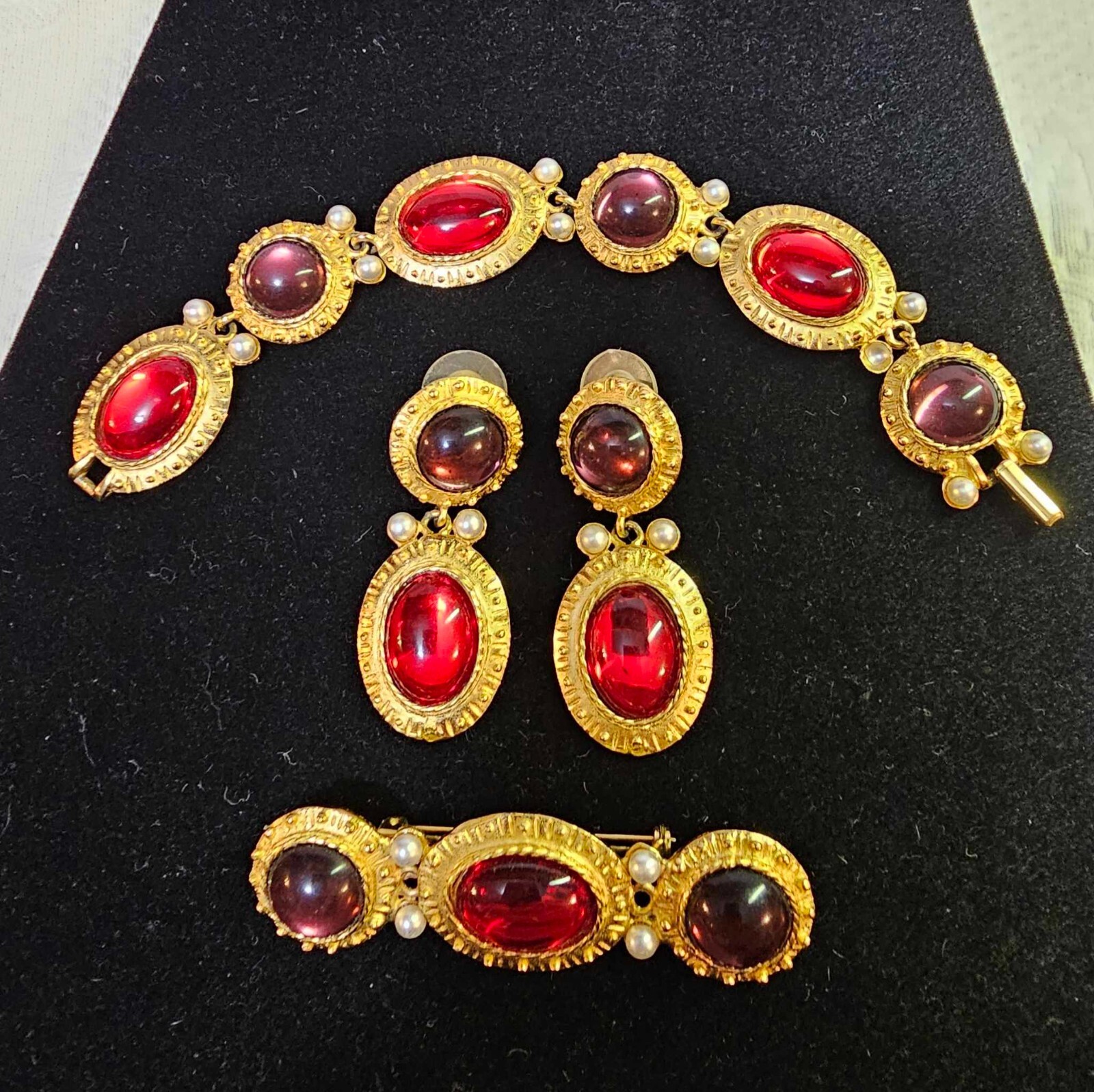 Goldtone Brooch Earrings & Bracelet set w purple red stones & faux pearl- READ