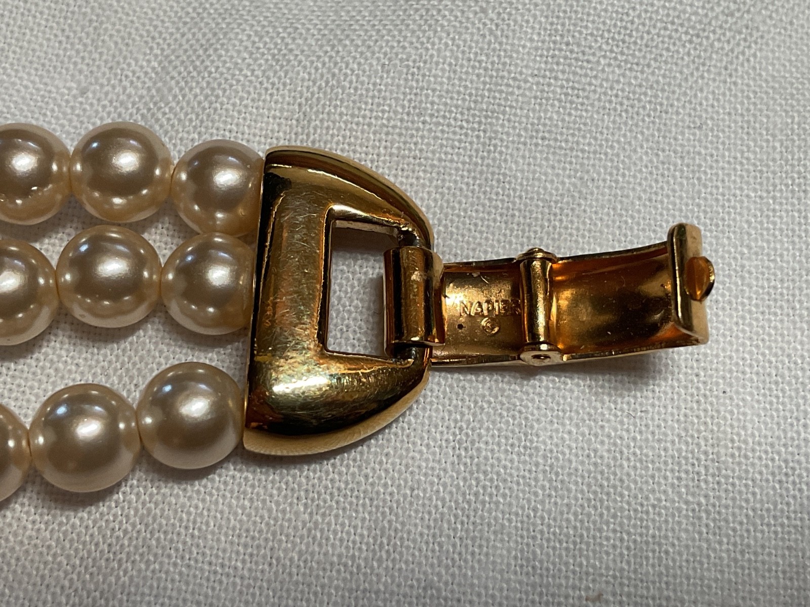 Napier faux pearl necklace with gold tone accents and bracelet