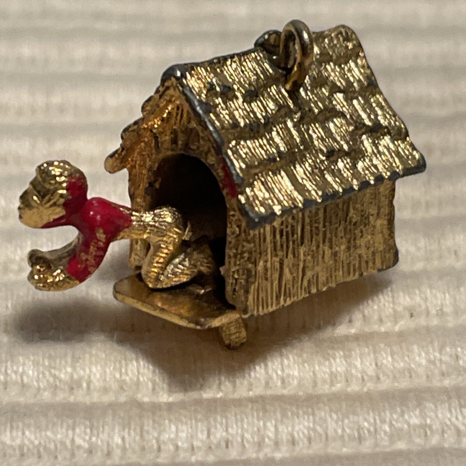 1960’s Man in Doghouse Goldtone Bracelet Charm Mechanical Signed C S Red Paint