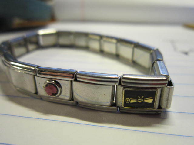 Stainless Steel Link Stretch Charm Bracelet Disney Lion King Diploma Flute Smile