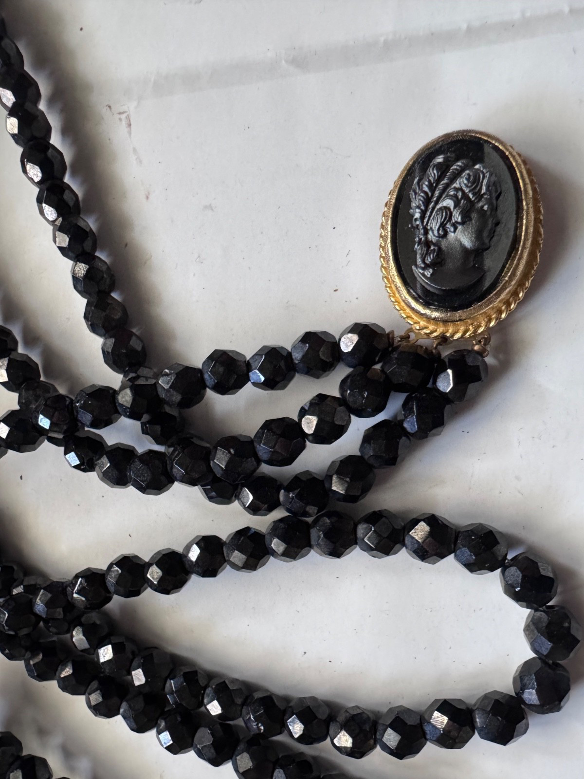 Vintage Necklace THREE STRAND FACETED CRYSTAL BEADS AND HEMATITE OVAL CAMEO 22″