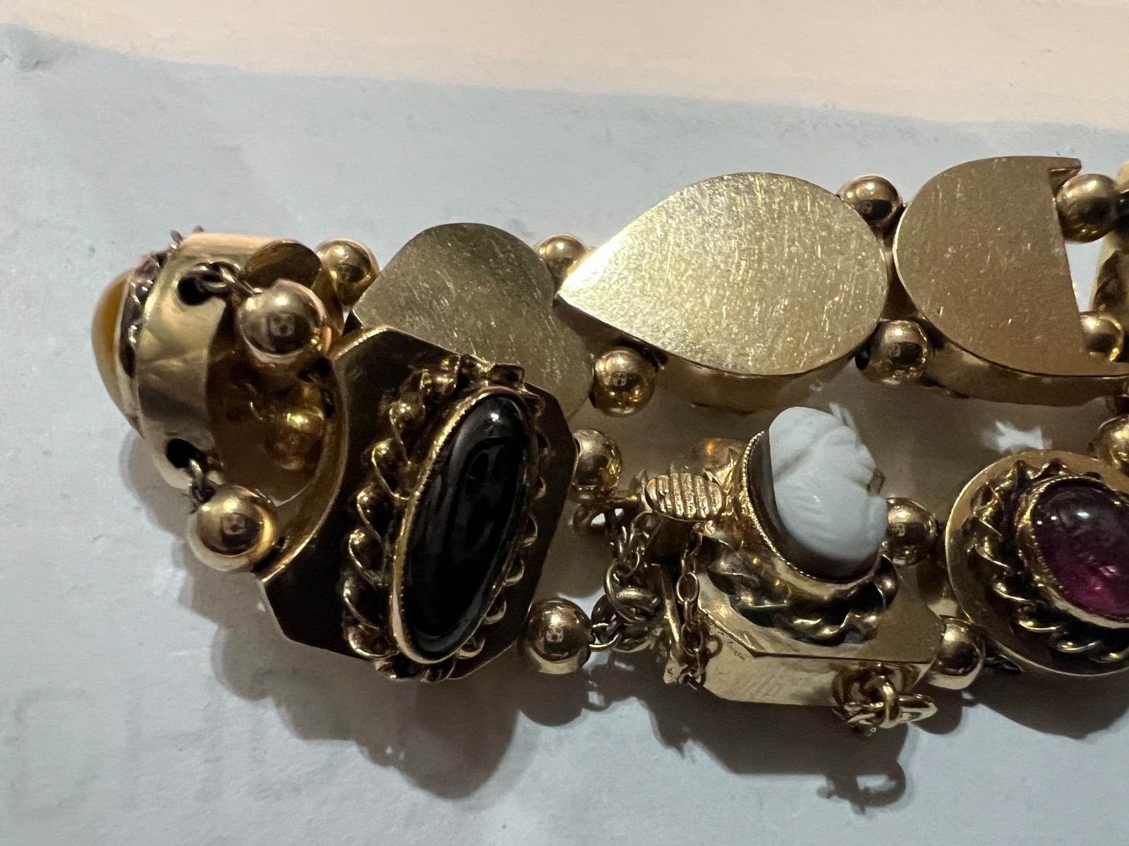 14k Gold ANTIQUE VICTORIAN GOLD CHARMS SLIDE BRACELET. CIRCA (1837-1901)