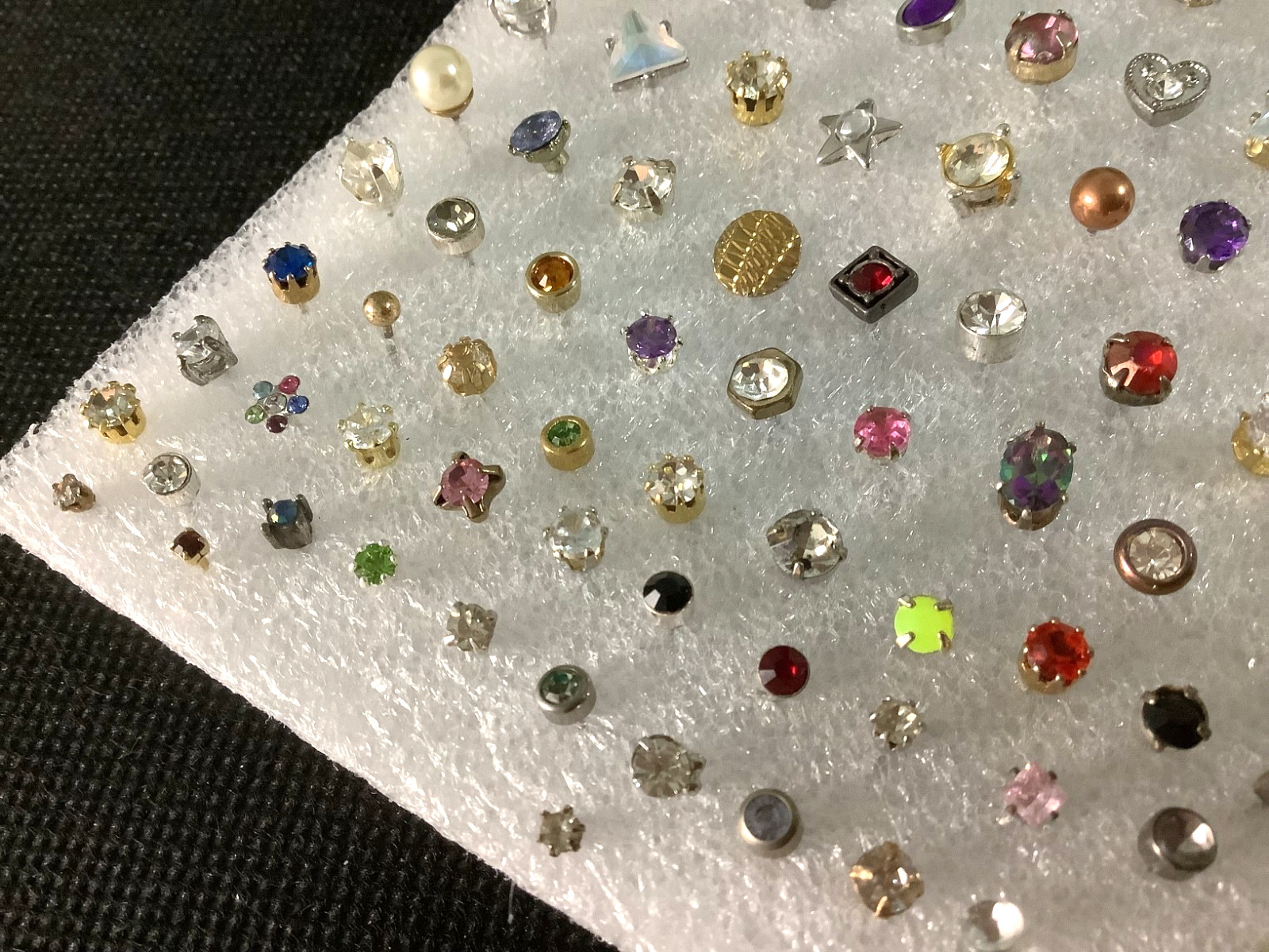 Huge lot of mixed vintage SINGLE stud earrings various unknown stones materials
