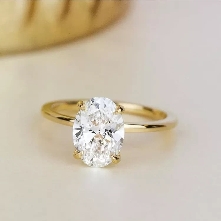 Oval Cut 2.00CT White Moissanite Women’s Engagement Ring In 10K Yellow Gold FN