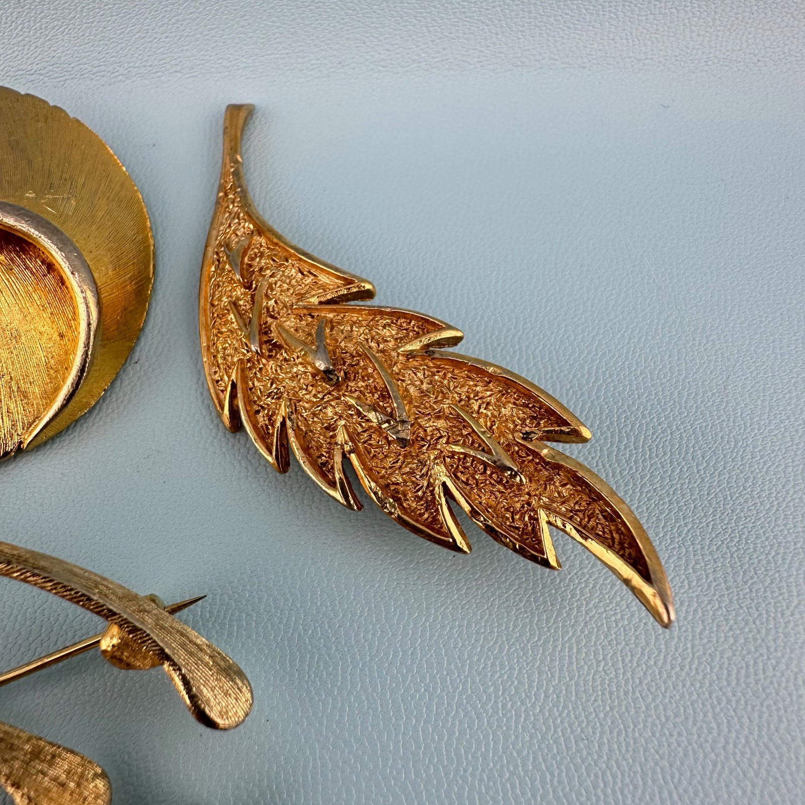 Vintage Designer Brooch Lot Gold Tone Textured Brushed Leaf Wishbone Signed