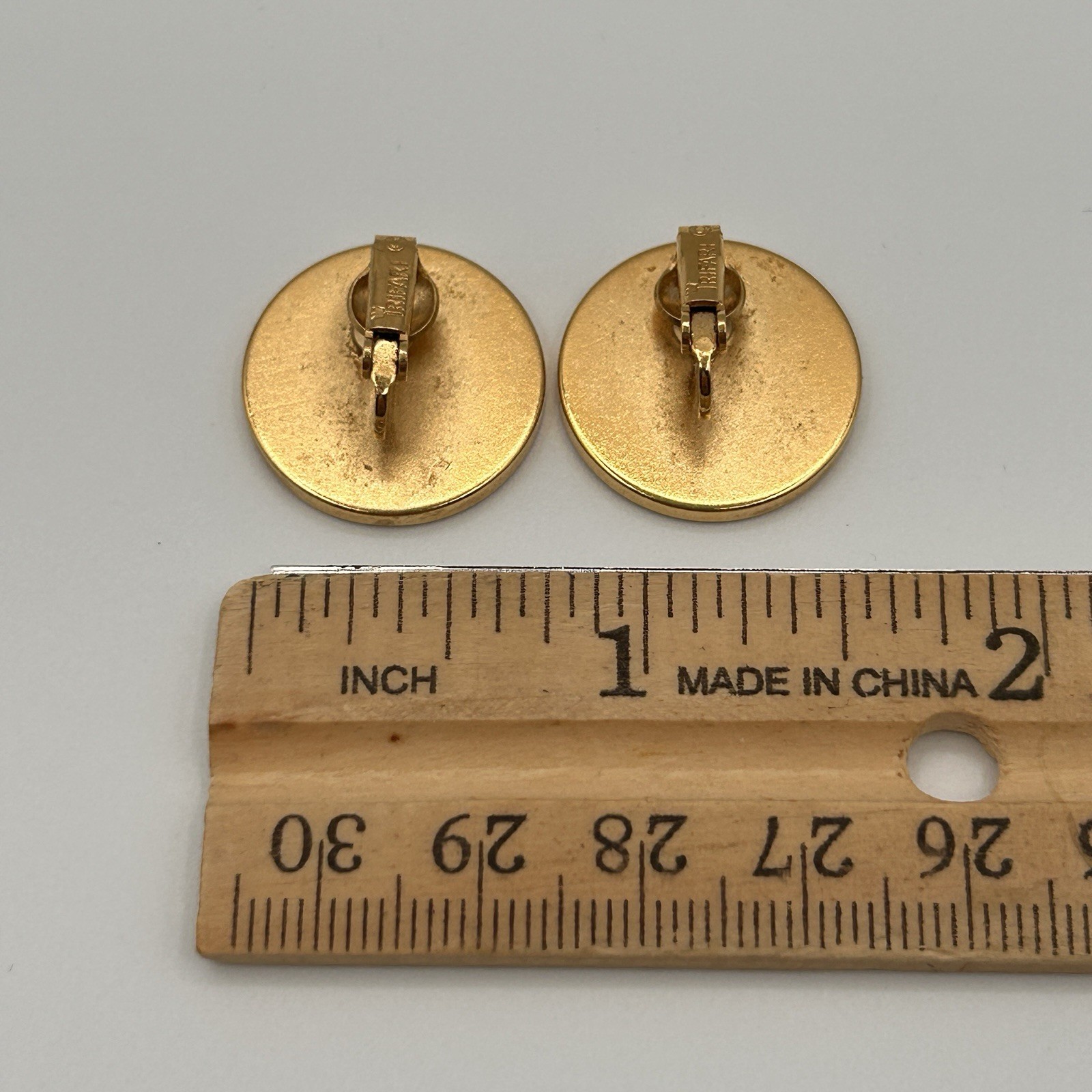 Vintage Trifari Clip On Earrings Gold tone Round Flat Signed .75″