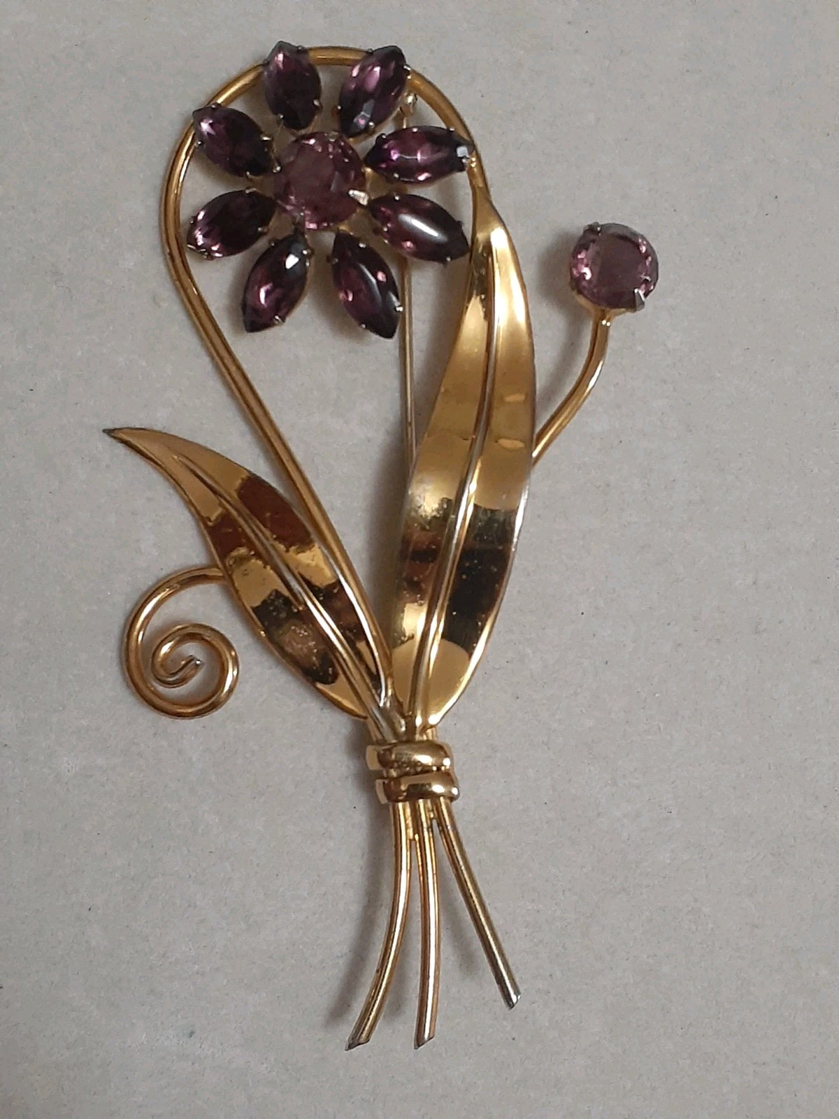 Sterling silver gold plated prong set purple glass flower & stem leaf brooch