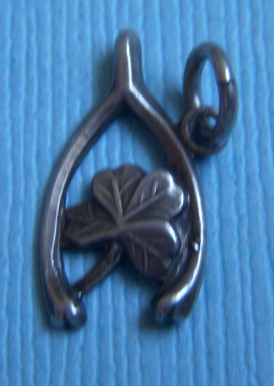 Vintage 40’s wishbone and clover lucky sterling charm