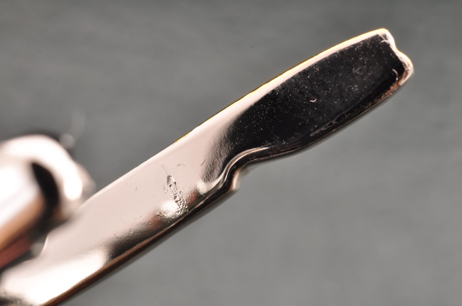 Near mint, gold and Cufflinks and silver tie clip, “Yves Saint Laurent”, case.