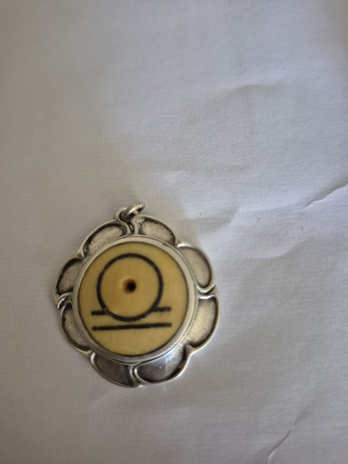 Rare Unusual Pendant. Sterling Silver And Bone? Weighs 17g and marked sterling