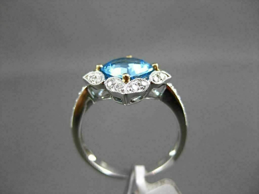 ESTATE 1.88CTW DIAMOND & AAA BLUE TOPAZ 14KT TWO TONE GOLD STAR FILIGREE RING