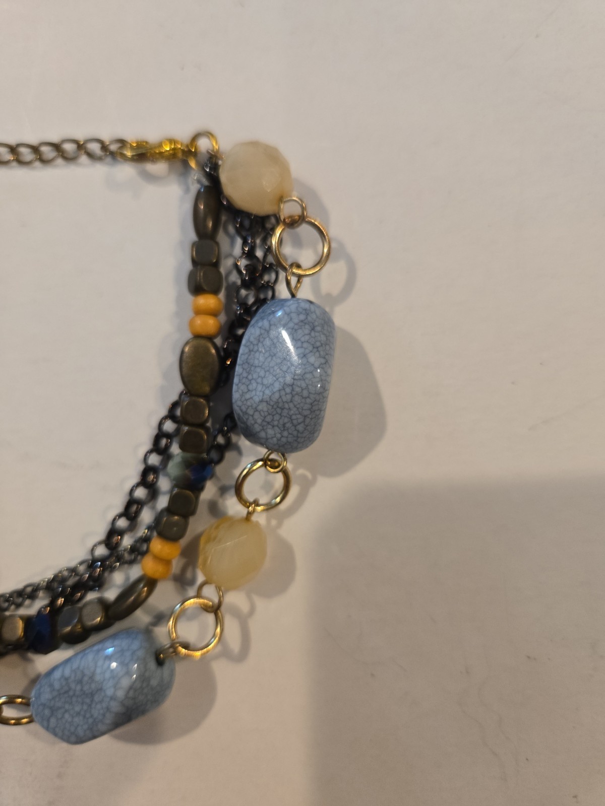 Vintage Gold Tone Multi Strand Bracelet With Blue, Wood, And Tan