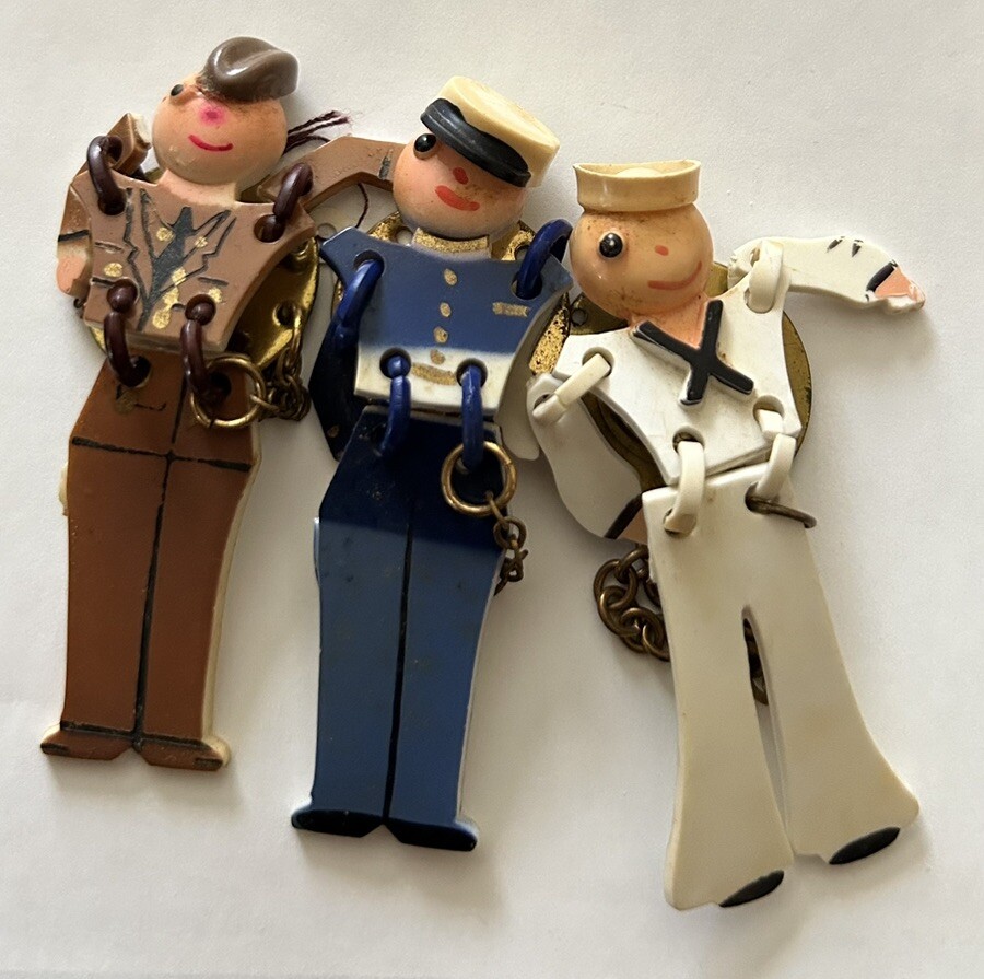 3 Vntg painted celluloid JOINTED SOLDIER ARMY PIN WWII era articulated men 2.5″