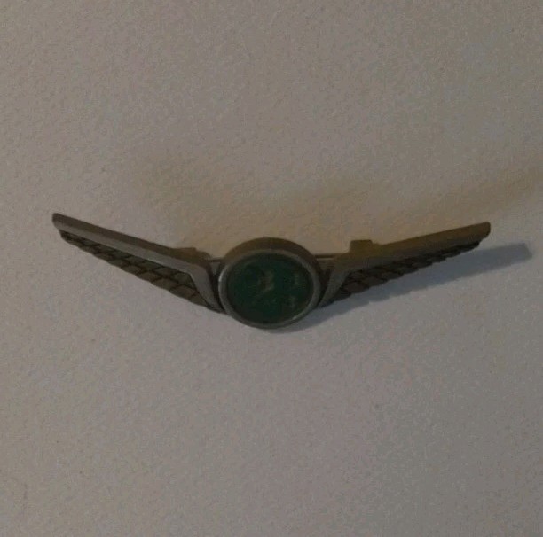 Stoffel Seals Signed Wing Brooch Pin Gold Tone Green Round Bezel Center